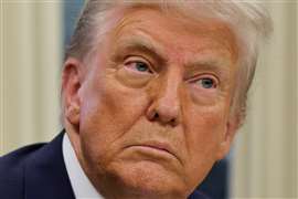 U.S. President Donald Trump looks on, on the day he signs an executive order in the Oval Office at the White House in Washington, U.S., 31 January 2025.