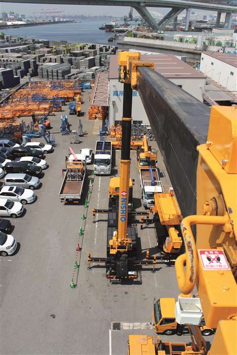 One of Nishio’s truck mounts  at work in a dockside setting. 